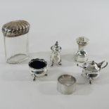 A collection of silver condiments, to include a silver lidded jar,