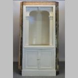 A Victorian painted pine corner cupboard,