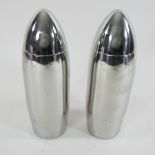 Two cocktail shakers, each in the form of a bomb,