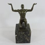 A bronze figure of a man,