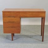 A 1970's teak desk,