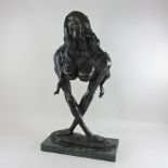 A bronze portrait bust of a an abstract Art Nouveau style lady,