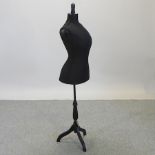 A black fabric mannequin,