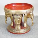 An Indian gilt ceremonial table, on elephant supports,