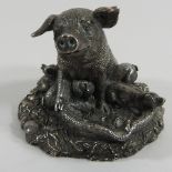 A sterling silver filled model of a sow and piglets, 7.