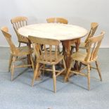 A pine circular gateleg dining table, 118cm,