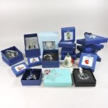 A collection of Swarovski, Wedgwood, Royal Doulton and Tiffany Christmas decorations,