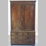 A 19th century mahogany linen press,