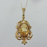 A citrine and pearl pendant,