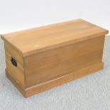 A handmade pine blanket box,