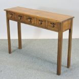 A handmade pine narrow hall table, containing five labelled drawers,