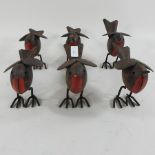 A set of six tin plate models of robins,