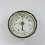 An early 20th century brass aneroid barometer,