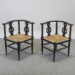 A pair of 19th century rush seated corner chairs