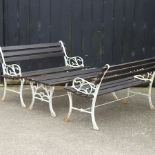 A pair of cast iron and wooden slatted garden benches, each 122cm,