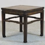 A mid 20th century Chinese occasional table,