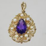 A 9 carat gold amethyst and pearl pendant, of pear shape, within in pierced surround, 2.