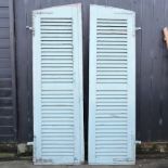 A pair of blue painted French wooden farmhouse shutters,