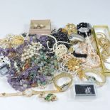 A collection of costume jewellery and modern wristwatches
