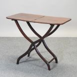 A 19th century mahogany folding coaching table,