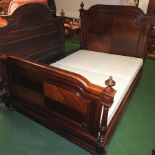 A 19th century French rosewood double bedstead