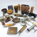 A collection of items, to include binoculars, corkscrew, wine funnels,