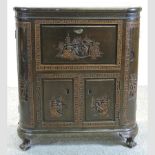 An early 20th century Chinese carved hardwood cocktail cabinet, with a hinged lid,