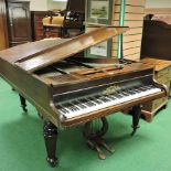 A 19th century rosewood cased baby grand piano, by John Broadwood and Sons, London, on turned legs,