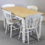 A pine dining table on cream painted legs, 151 x 75cm,