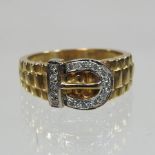 A 9 carat gold and diamond rolex style buckle ring