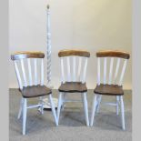 Three elm seated and painted splat back chairs, together with a grey painted standard lamp,