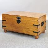 A hardwood blanket box,