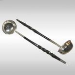 A pair of silver toddy ladles, each with a twisted whalebone handle, marks indistinct,