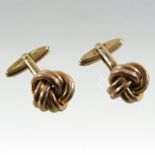 A pair of 9 carat gold cufflinks, of Celtic knot design,