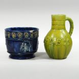 A Castle Hedingham green glazed pottery jug, inscribed 'Car Rex', 18cm high,