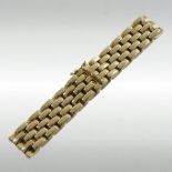 A 9 carat gold gate bracelet, the clasp with safety catch,