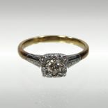 An 18 carat gold illusion set diamond ring