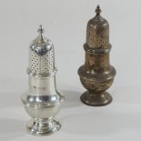 A pair of Garrards silver sugar casters, each of baluster shape, with a pierced removable cover,