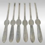 A set of six Edwardian silver lobster picks, each of typical shape and engraved with a lobster,