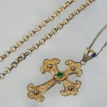 An 18 carat gold cross pendant, with filigree decoration, on a fine chain,