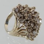 A 14 carat white gold diamond cluster ring,