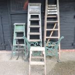 Four various step ladders,