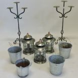 A set of three iron lanterns,