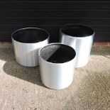 Three silver garden pots,