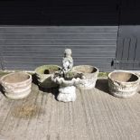 A pair of reconstituted stone garden planters, 47cm, together with another pair similar,