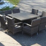 A rattan garden table, 124 x 124cm,