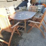 A teak garden table, 180 x 110cm,