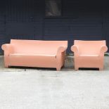 A brown moulded plastic garden sofa, after a design by Philippe Starck for Kartell, 190cm,