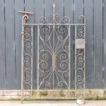 An antique wrought iron garden gate,