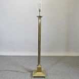 A 19th century brass standard lamp,